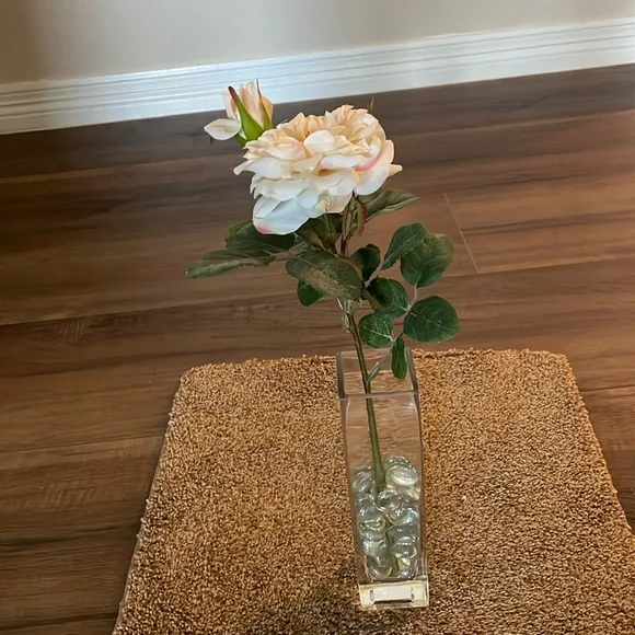 Beautiful realistic looking blooming rose with bud