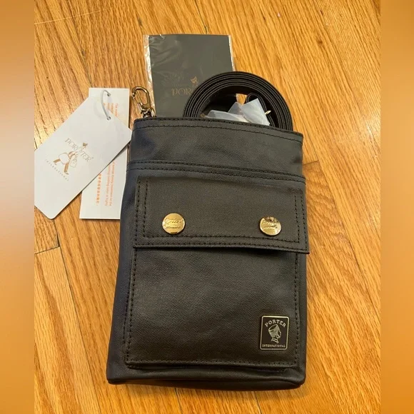 - Porter international men sling crossbody travel leather Bag