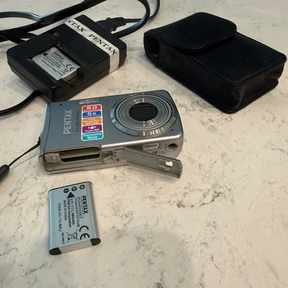 Pentax Optio M50 8.0MP Compact Digital Camera Silver Charger, 2 Batteries Bundle
