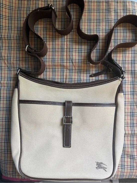 Burberry blue label messenger bag.