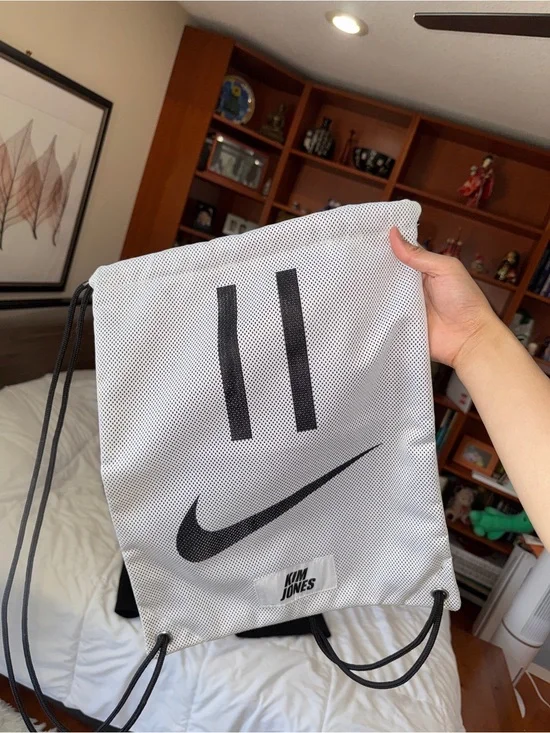 Nike White Mesh Drawstring Bag with Black Swoosh