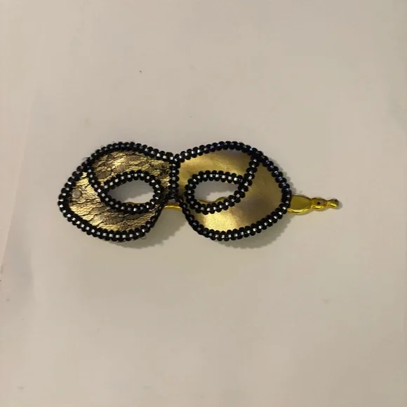 Black and gold masquerade mask with beaded handle #masquerade #party #glamour