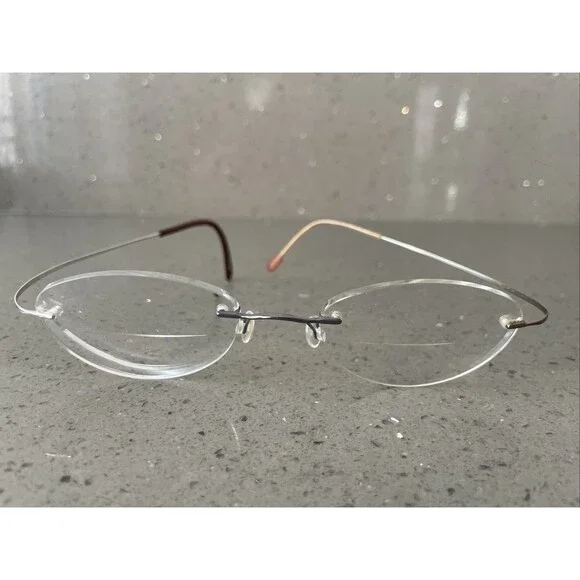 Marchon Airlock 2 Eyeglasses Frames only Rimless 140 Brown Silver