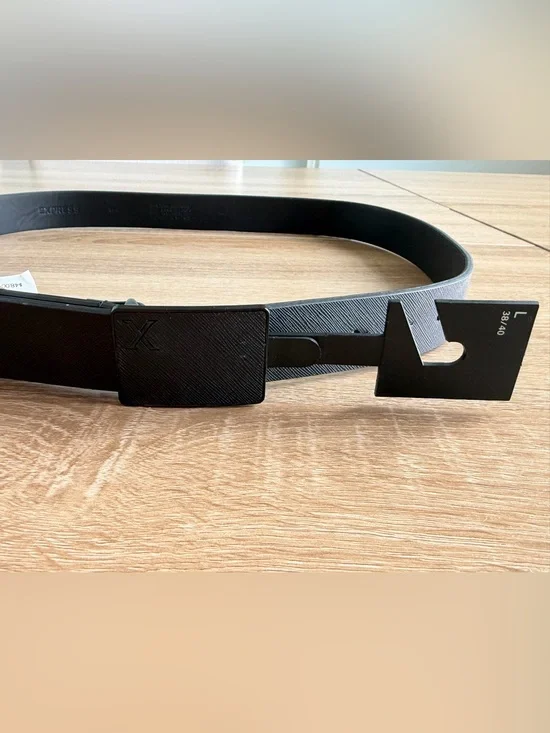 NEW with TagExpress black leather belt with textured buckle, size 38/40