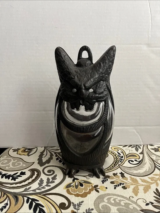 Cast iron owl candle holder lantern with hand blown glass.