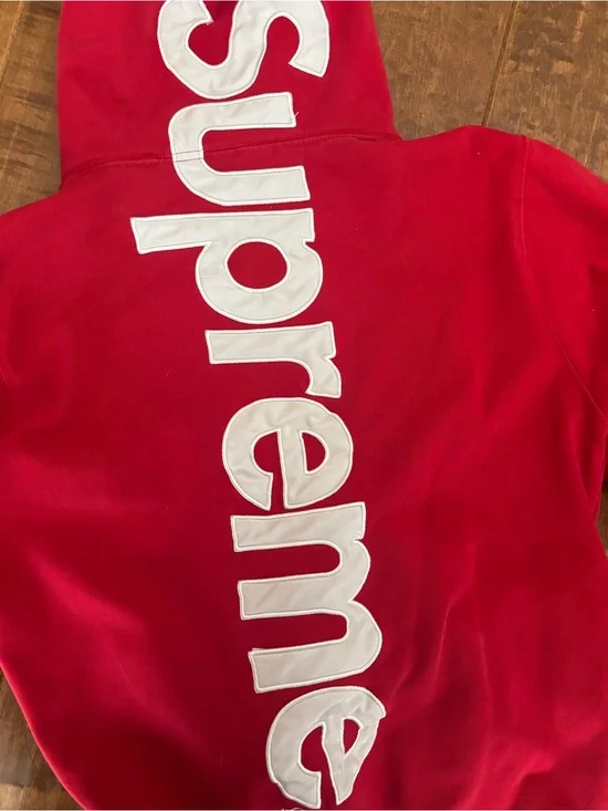 Supreme Red Hoodie with White Logo Tag
