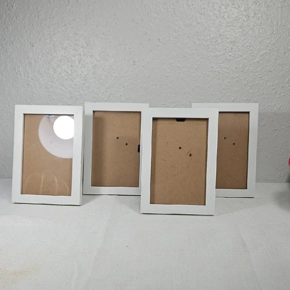 Set of 4 white Harbortown wooded picture frames :6.75x4.75 hold 4x6