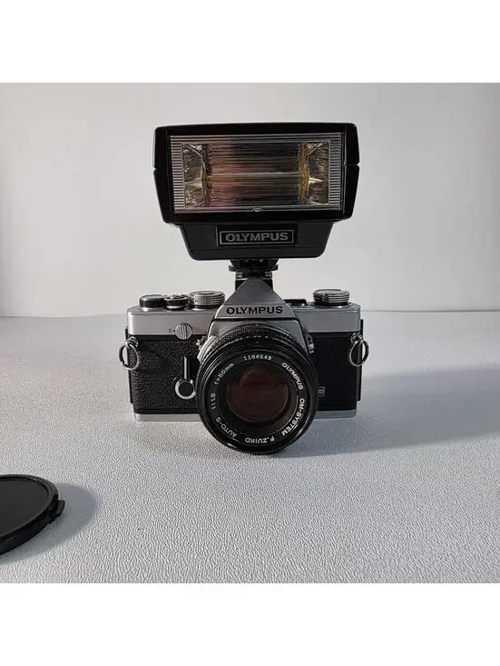 Olympus OM-1 MD 35mm SLR Film Camera w/ F.Zuiko 50mm f/1.8 Lens & Flash Tested
