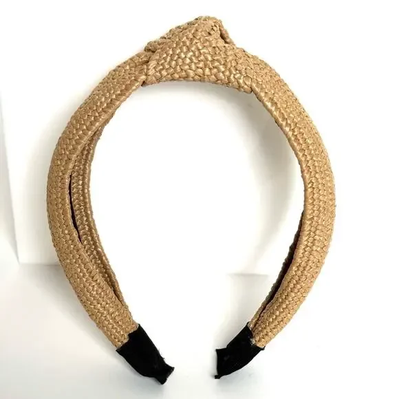Women’s rare Eugenia Kim Rafia, knot headband Purchased at Henry Bendel/Like New