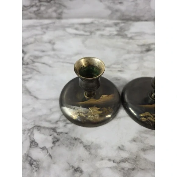 Vtg Pair Japanese brass bud vases featuring an etched pagoda and mountain scene