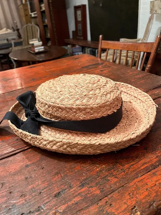 Classic Helen Kaminski Raffia Hat with black ribbon