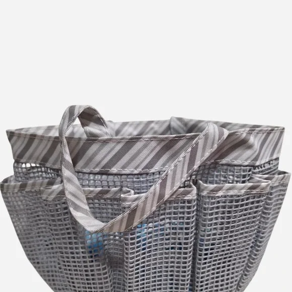 Grey striped mesh shower caddy with clear bottom