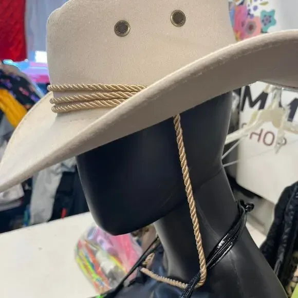 Tan cowboy hat with rope
