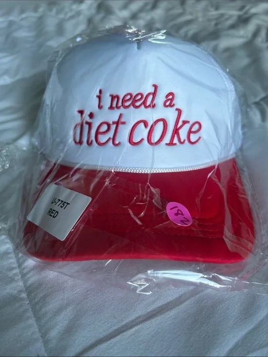 New in the poly bag!  White and Red Embroidered 'i need a diet coke' Trucker Hat