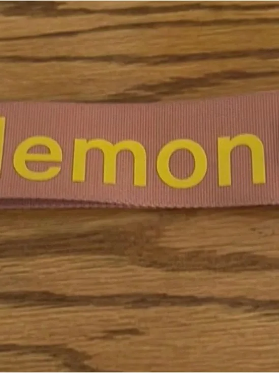 lululemon athletica pink strap with yellow logo key/card holder
