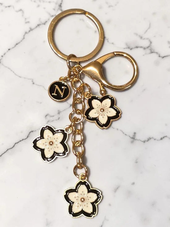 Gold-Tone Black & White Floral Keychain Charm with Letter 