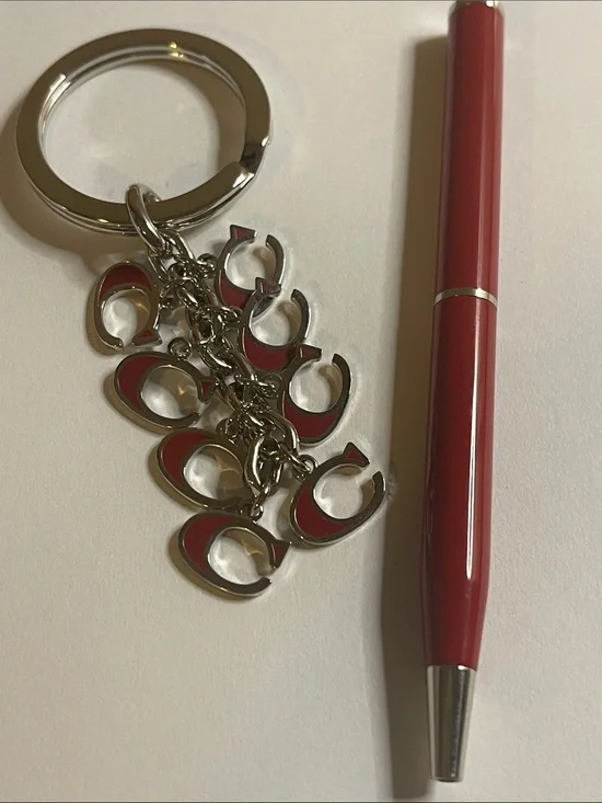Coach Silver-Tone Keyring with Red Enamel 'C' Charms and Coach Pen