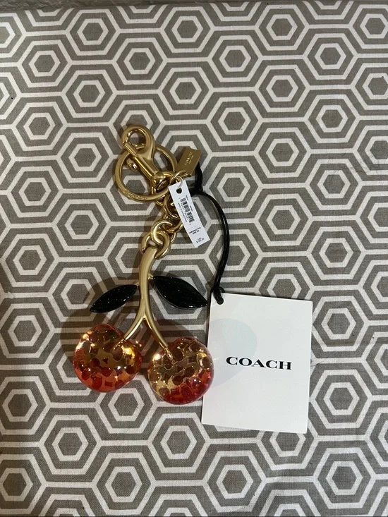 COACH Gold Cherry Charm Keyring with Red Sequin Cherries and Green Leaves
