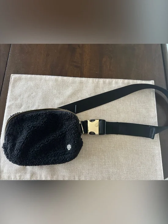 lululemon athletica Black Sherpa Belt Bag with Gold Hardware