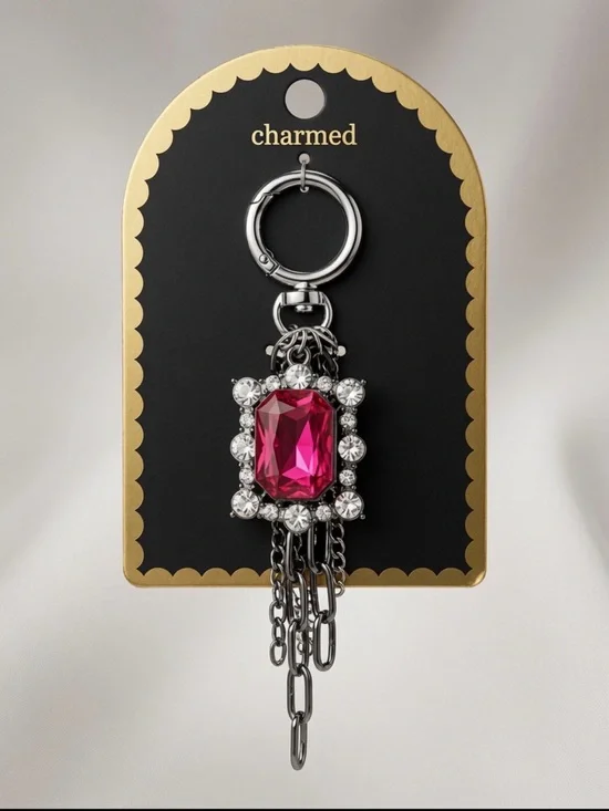 Charmed Silver-Tone Bag Charm Key Ring with Fuchsia Gem Accent