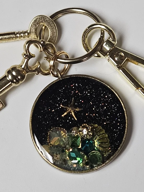Gold Acquatic Keychain Bag Charm Black Galaxy and Green Crystal Accents