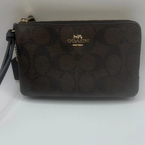 Coach signature‎ Brown Wristlet with Black and gold Accents