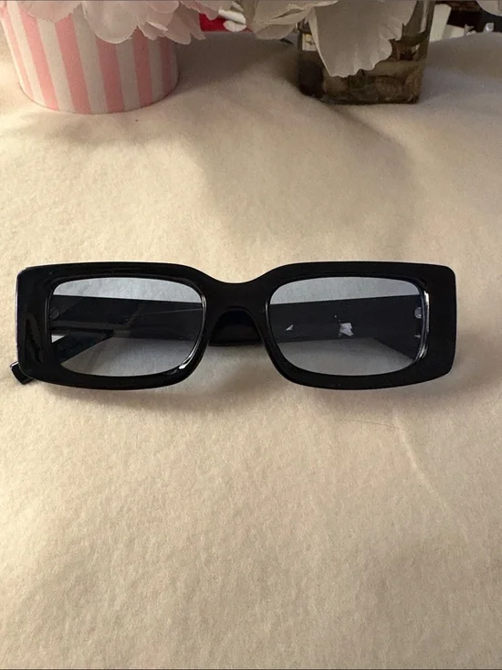 Rectangular Black Retro Sunglasses with light Baby blue lens.