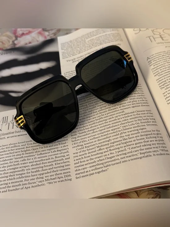 Gucci oversized black and gold sunglasses