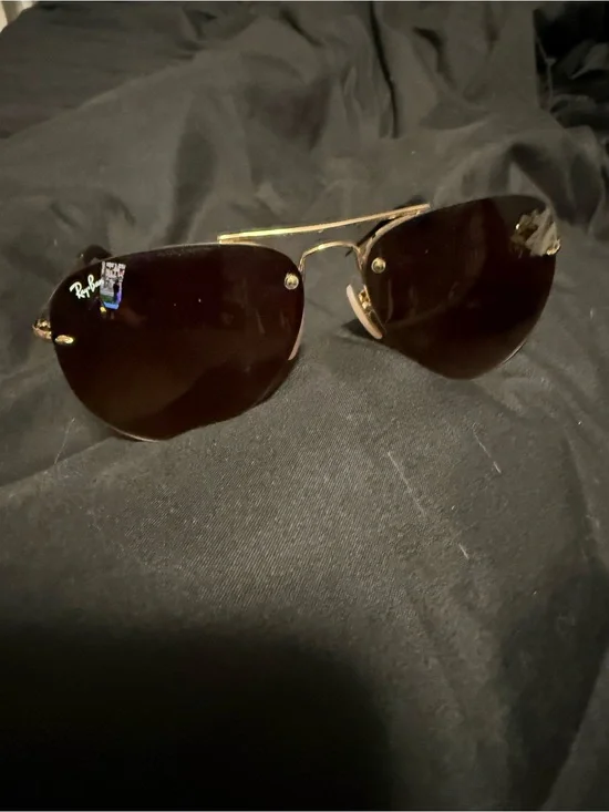Ray-Ban Women's Gold Frame Dark Brown Lens Rimless Sunglasses