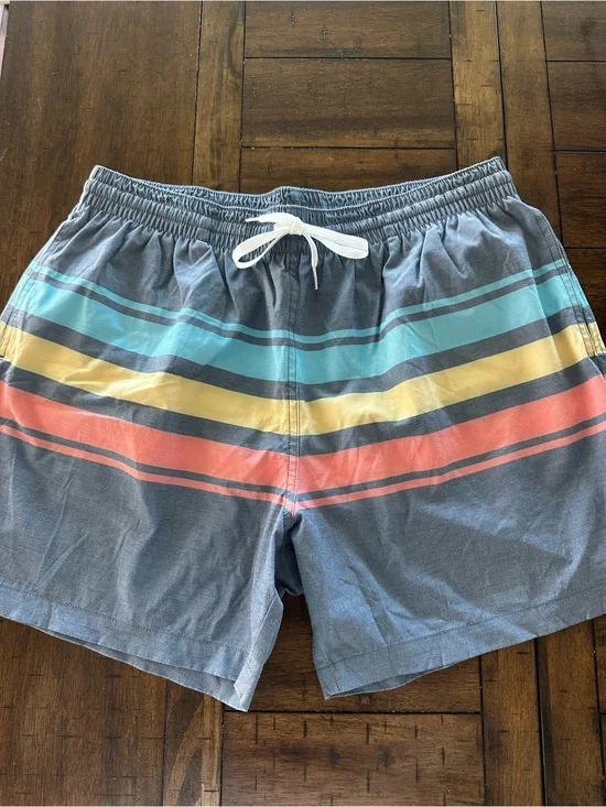 chubbies Blue Swim Trunks with Aqua Yellow and Coral Stripes 5.5”
