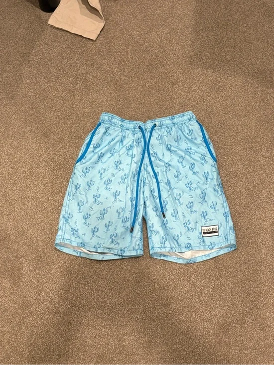 Light Blue Cactus Print Swim Trunks with Blue Trim