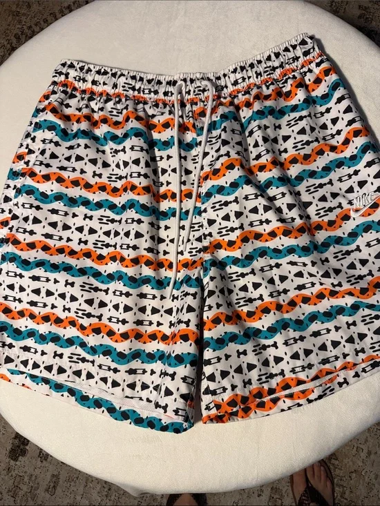 Nike N7 line White Swim Shorts with Teal, Orange & Black Tribal Pattern