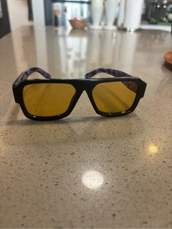 Prada Black Frame Sunglasses with Amber Yellow Lenses