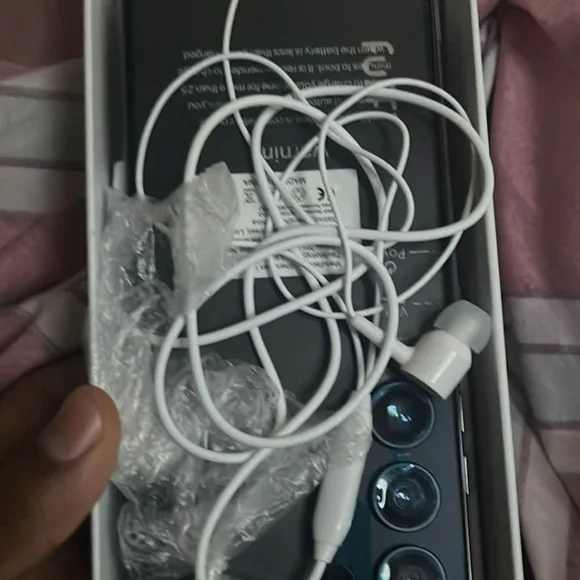 Samsung Smartphone with Black and White Accessories