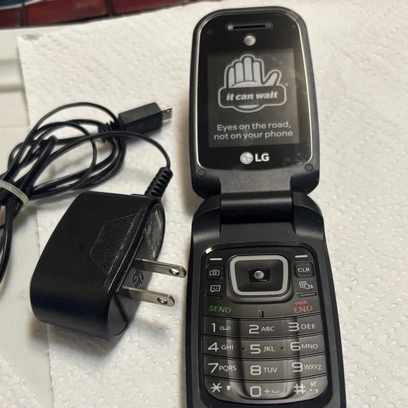 LG Black New Flip Phone with old Charger Included