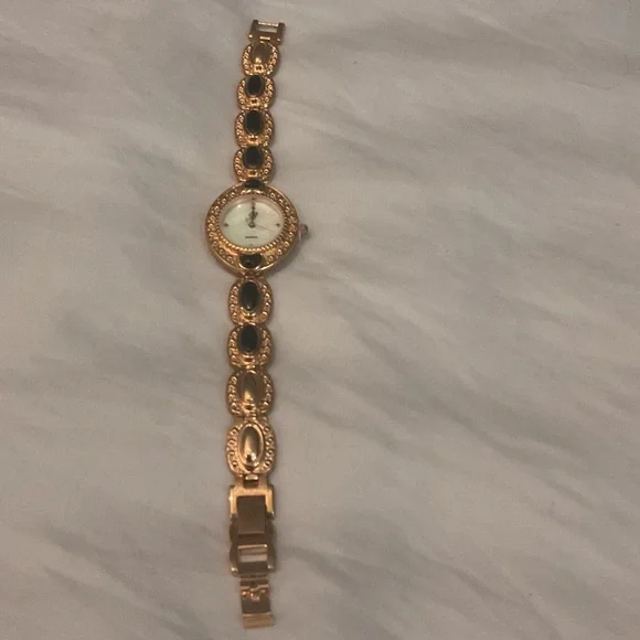 Elegant Gold and Black Women's Watch