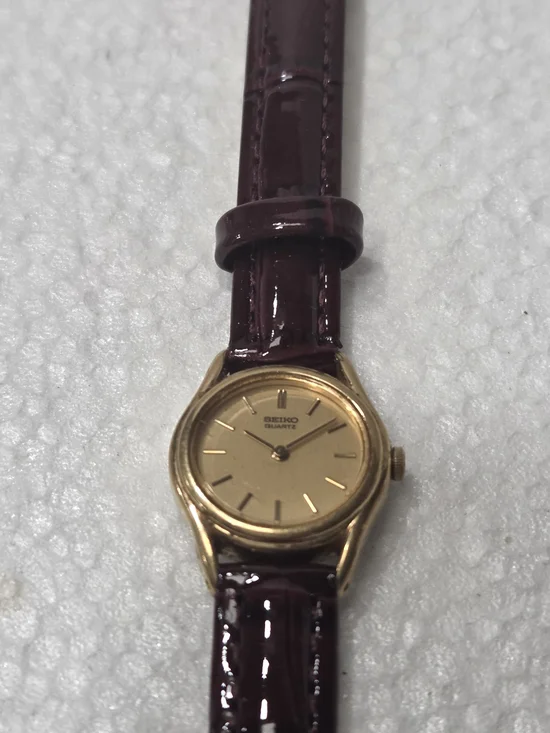 Seiko Gold Dial Women's Quartz Watch with Burgundy Patent Strap 2P20-0080