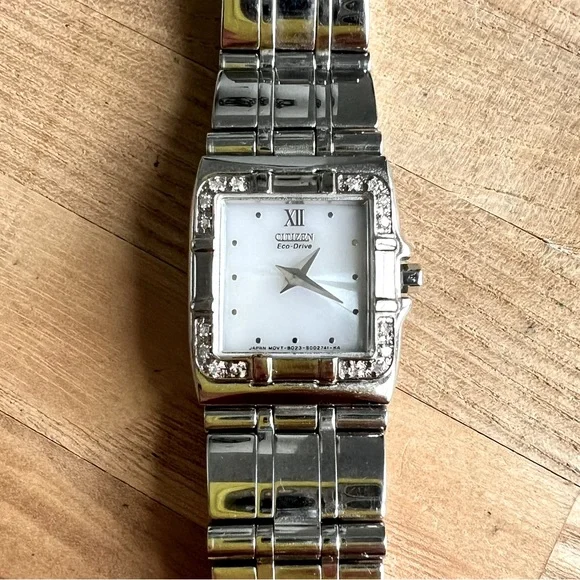 Citizen eco-drive ladies square dial silver tone diamond dress watch