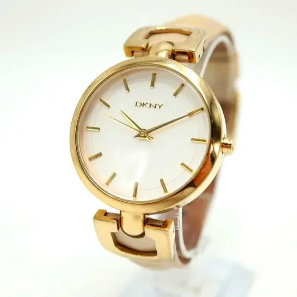 DKNY Womens Gold and Silver Tone Watch 36mm Leather Strap with New Battery