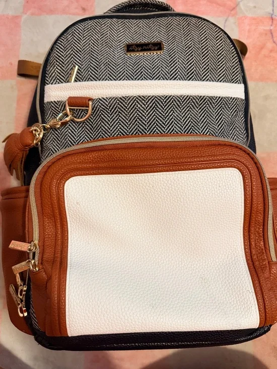 Itzy Ritzy Black Herringbone Backpack Diaper Bag with White and Brown Trim