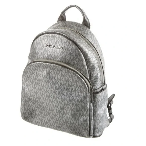 Michael Kors Silver shimmer Monogram Backpack shiny zipper leather compartments‎