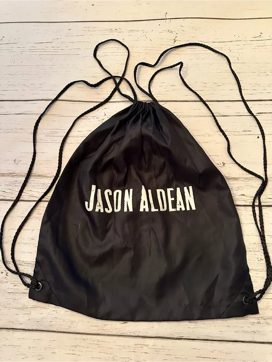 Black Drawstring Backpack with White Text Logo