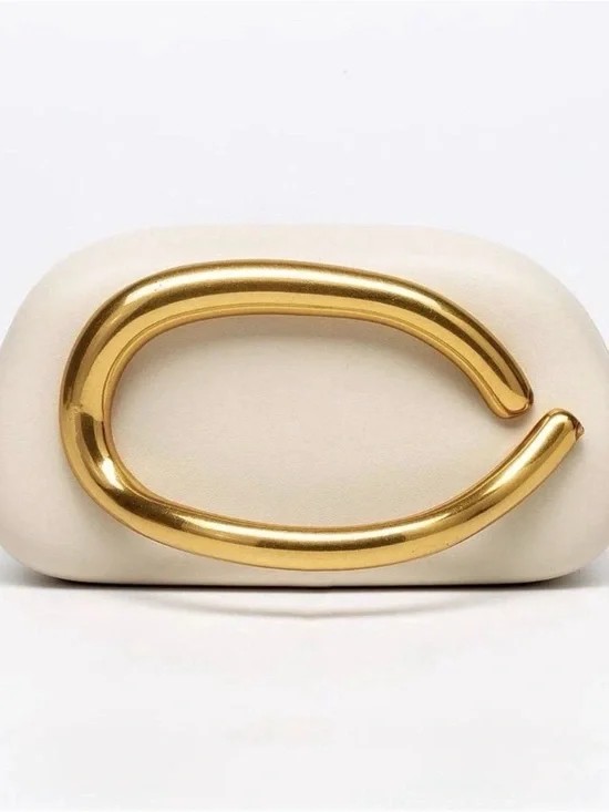 Elegant Cream Clutch with Statement Gold Handle