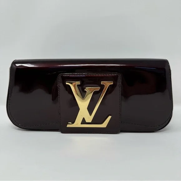 Louis Vuitton Dark Burgundy Clutch with Gold Logo