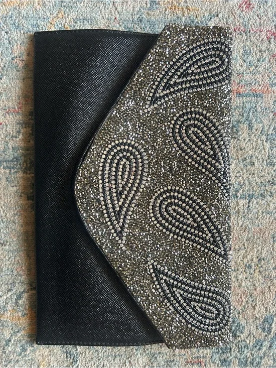 Natasha Couture Black Satin Wristlet with Metal Logo