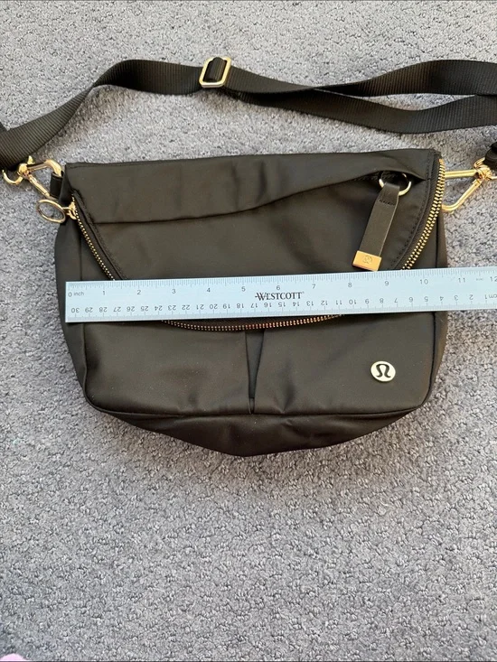 lululemon athletica black crossbody bag with gold hardware