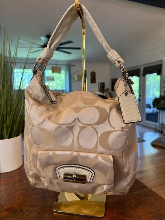 Coach Beige Signature Hobo Bag with Turn-Lock Pocket
