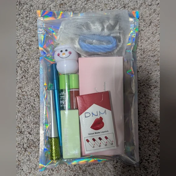 Makeup Bag with Assorted Cosmetics + Mystery Bag Of Goodies