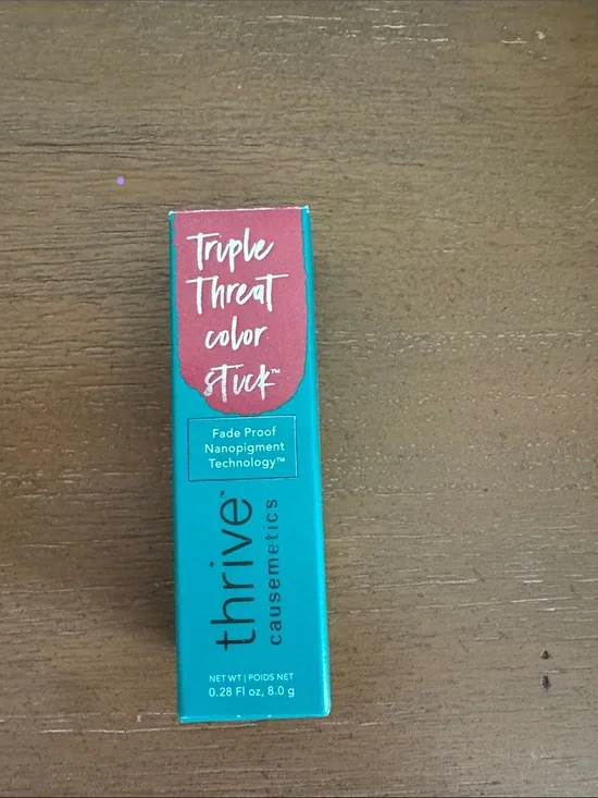 thrive causemetics Triple Threat Color Stick - Teal & Coral Red