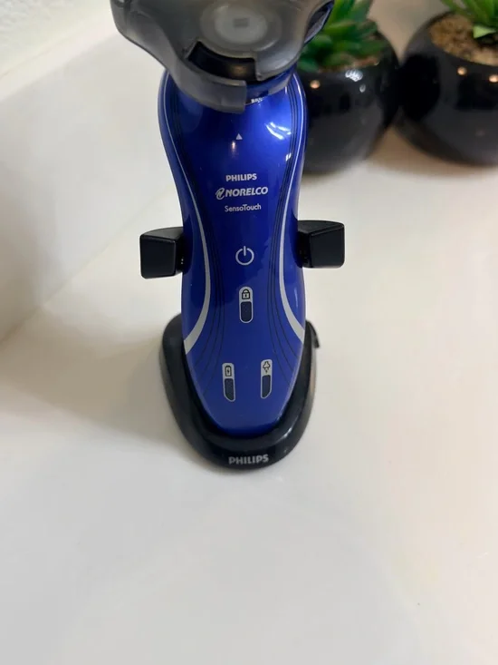 Philips Black Electric Grooming Device with Silver Accents